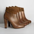 Tronchetto Selva in pelle marrone con risvolto in camoscio
